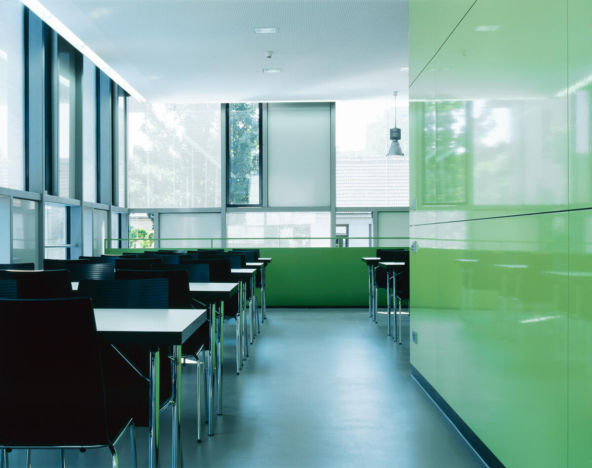 Upper area of the Mensa with tables and chairs