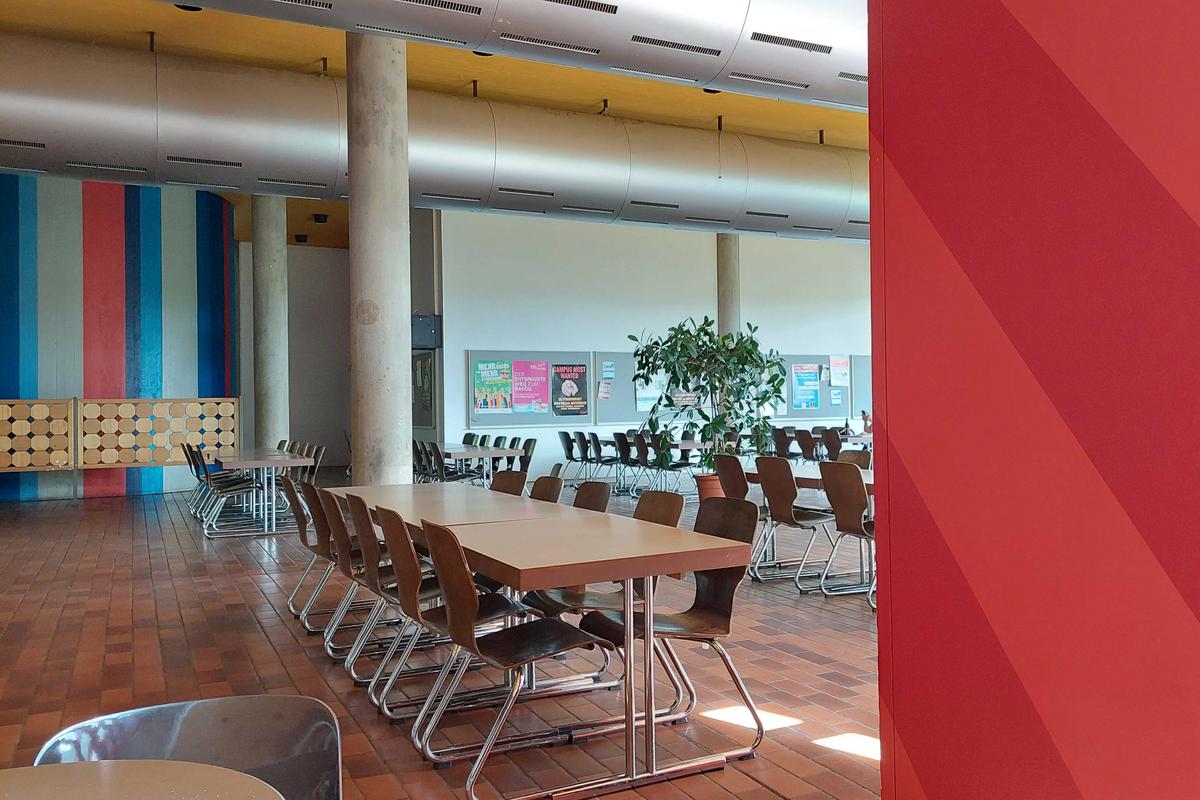 Eating area with several tables and chairs